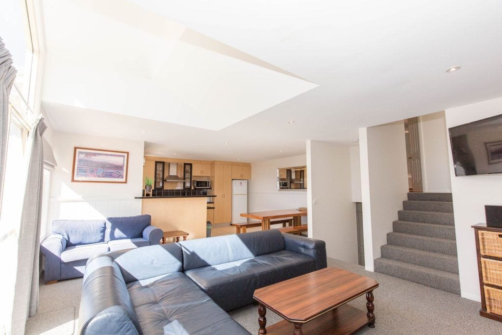 Torino 2 - 2/14 Nettin Circuit - Accommodation Jindabyne Torino 2 is a large modern four bedroom townhouse, with spacious open plan living area, large kitchen, and dining area. A pretty green outlook to the lake makes this a great holiday with extended family or friends.